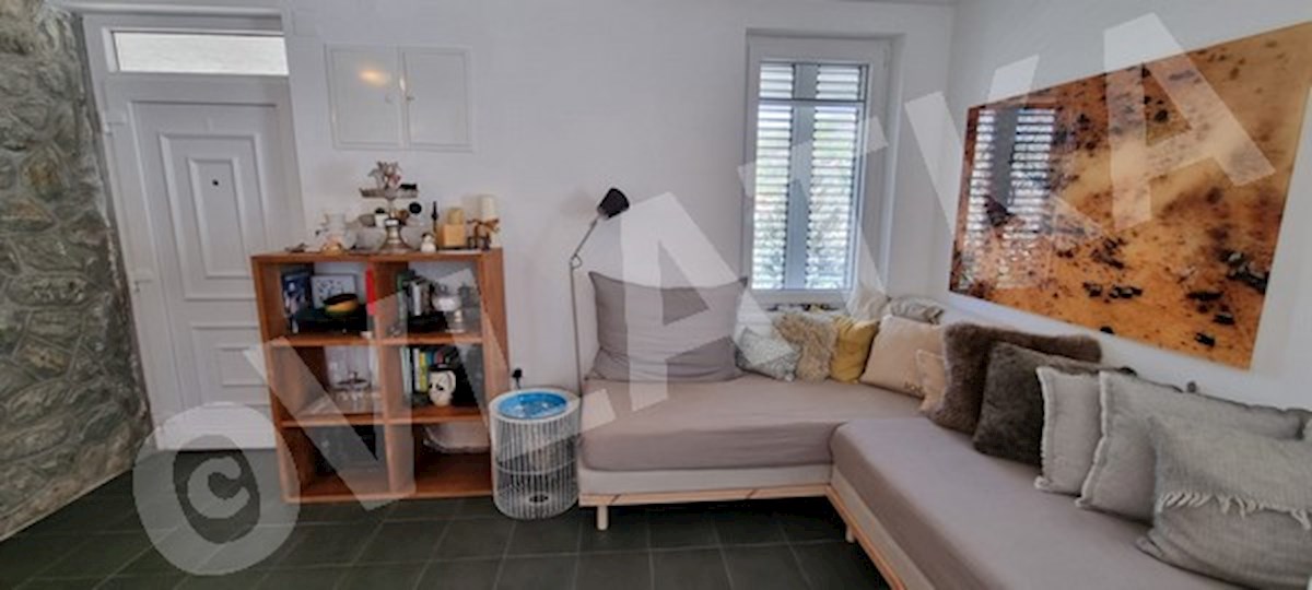 CASA UNIFAMILIARE NELLA NATURA CON GIARDINO E GARAGE