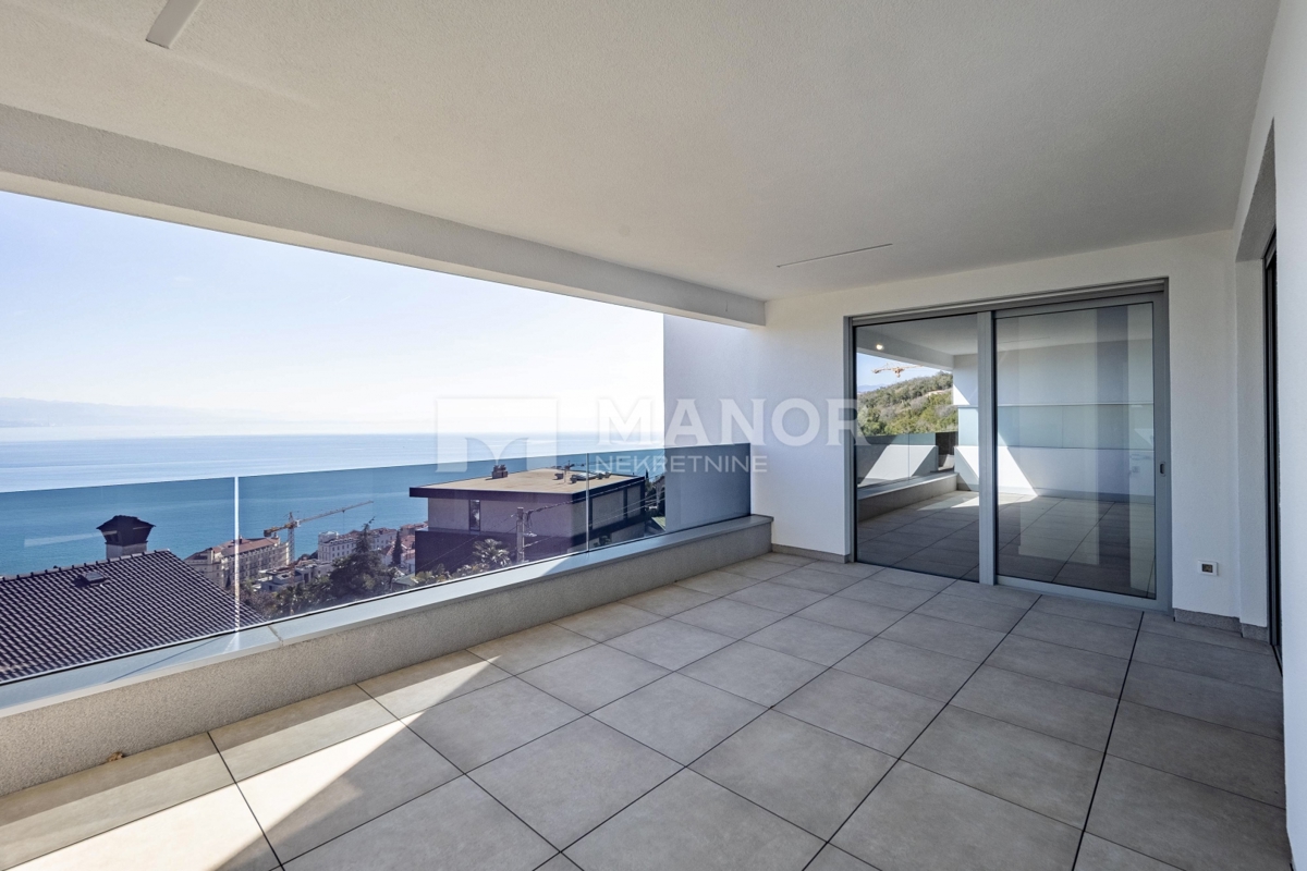 OPATIJA, CENTRO – Nuova costruzione, appartamento di lusso 2 camere + sala da pranzo con vista, piscina condominiale, garage