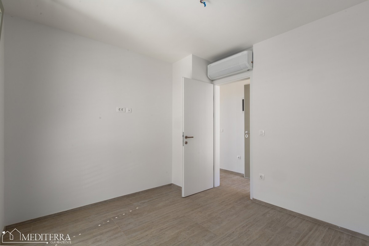 Appartamento al primo piano con terrazza sul tetto, Cittanova, Istria