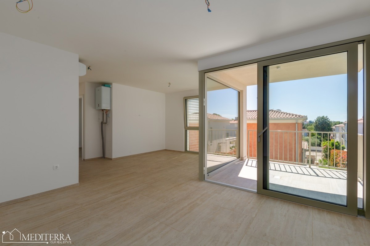 Appartamento al primo piano con terrazza sul tetto, Cittanova, Istria