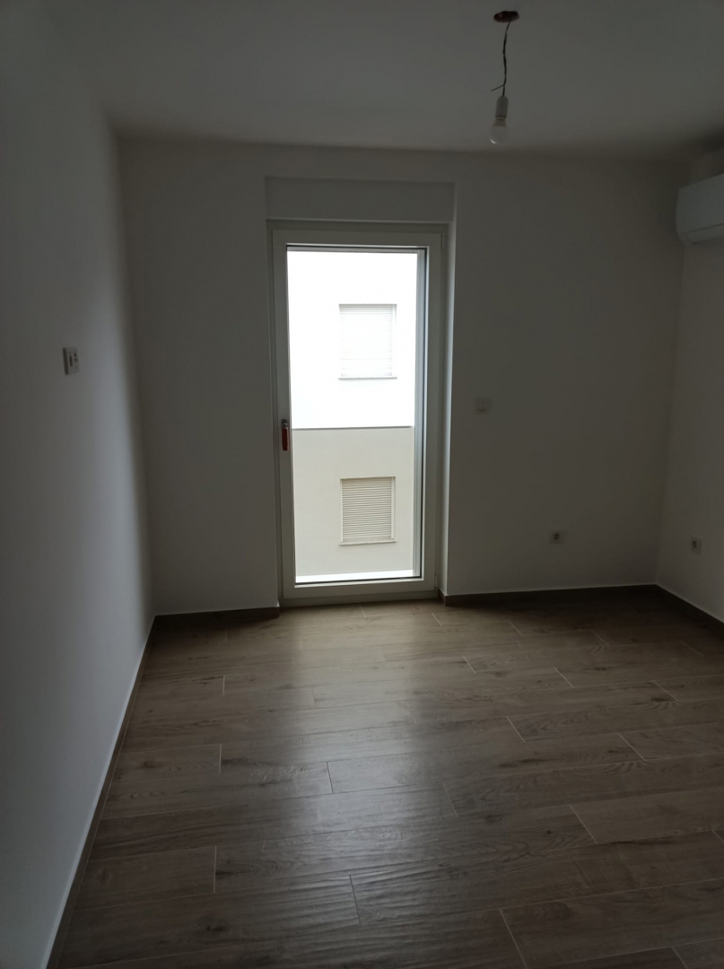 ISOLA DI PAG, POVLJANA - Appartamento con due camere da letto in un edificio di nuova costruzione.