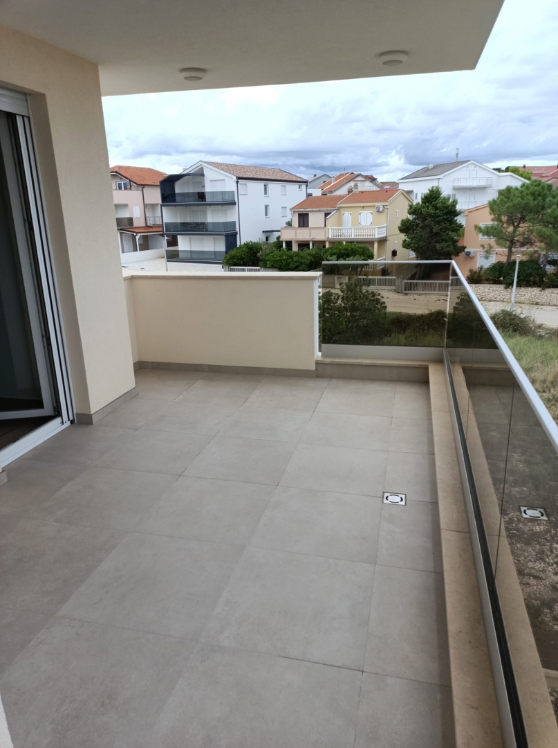 ISOLA DI PAG, POVLJANA - Appartamento con due camere da letto in un edificio di nuova costruzione.