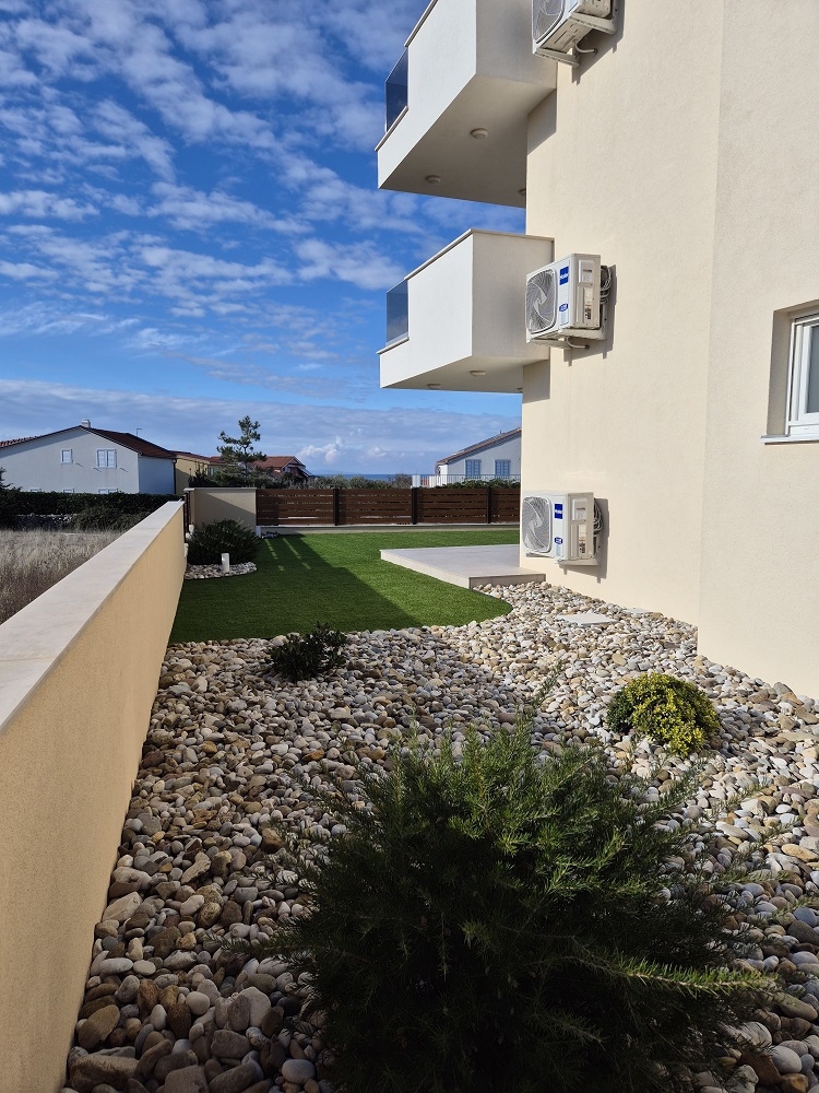 ISOLA DI PAG, POVLJANA - Appartamento con due camere da letto in un edificio di nuova costruzione.