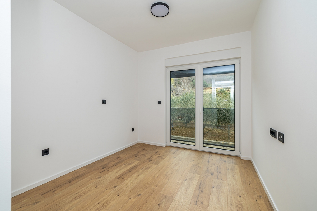 Zona BAŠKA - Appartamento con due camere da letto e due posti auto, nuova costruzione