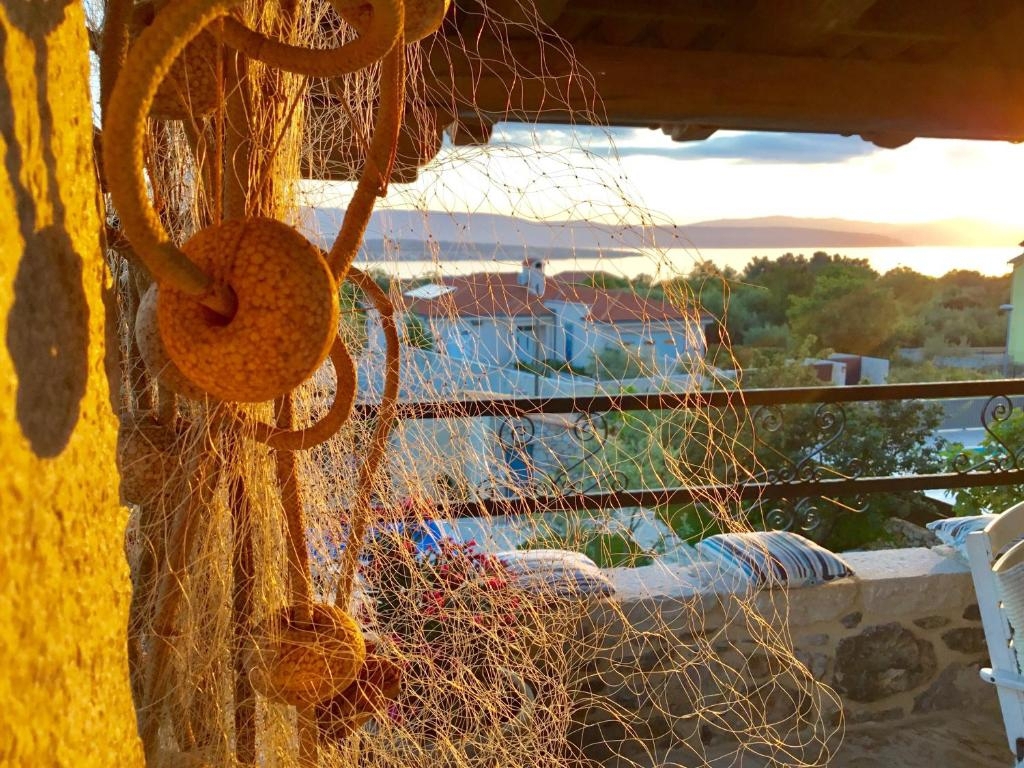 ISOLA DI KRK, MALINISKA - Casa rustica con piscina e vista sul mare