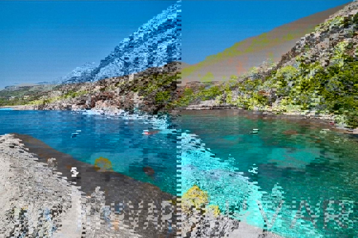 Terreno con progetto e vista mare