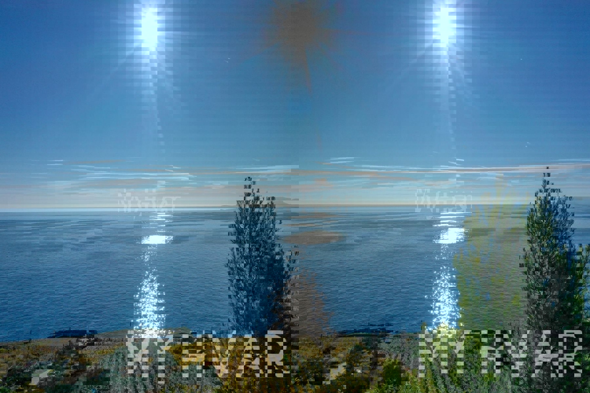 Terreno con progetto e vista mare