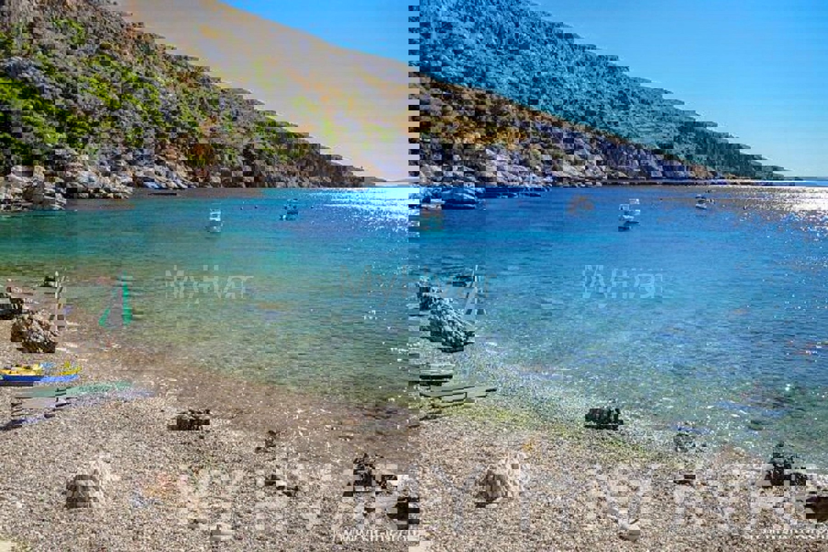 Terreno con progetto e vista mare