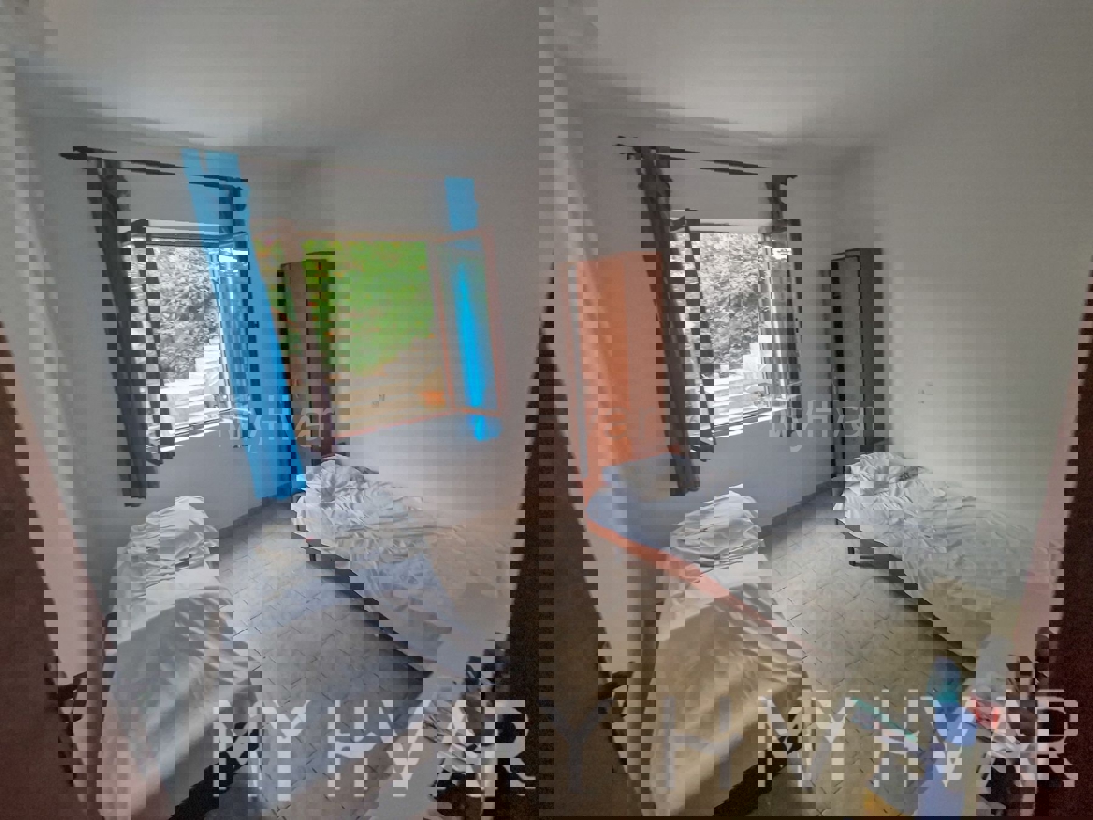 Appartamento in casa prima fila mare