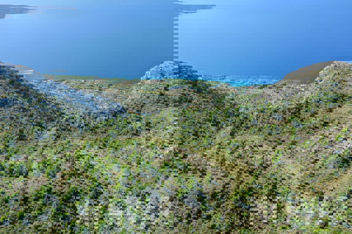 Terreno con vista panoramica e casa