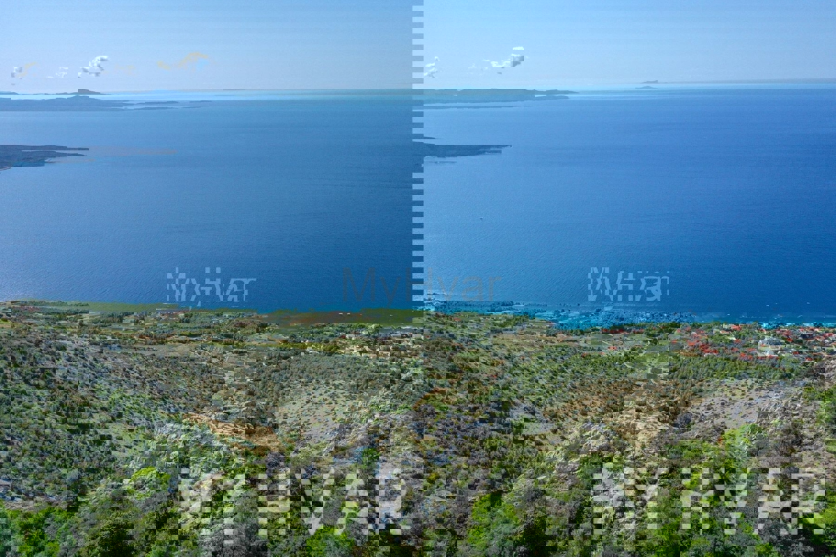 Terreno con vista panoramica e casa