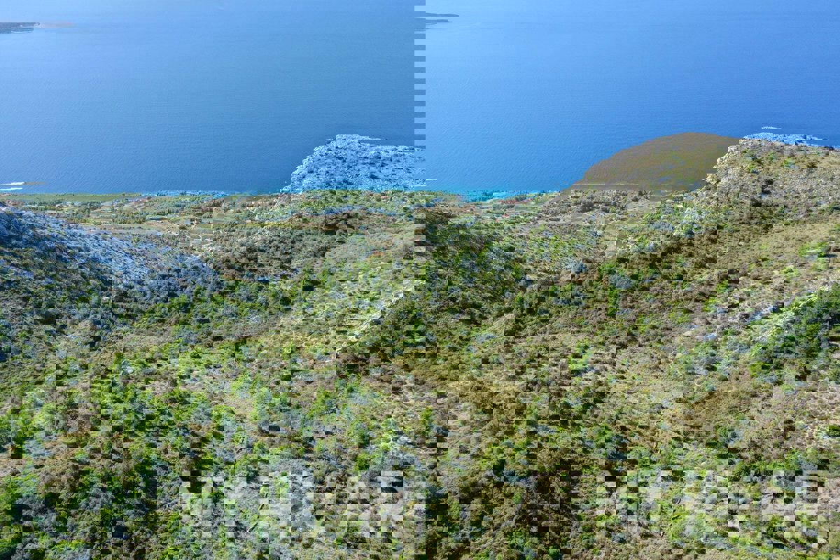 Terreno con vista panoramica e casa