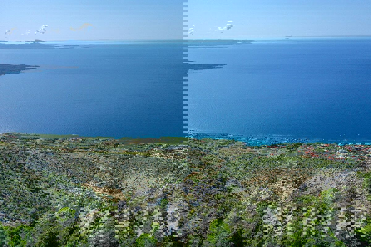 Terreno con vista panoramica e casa