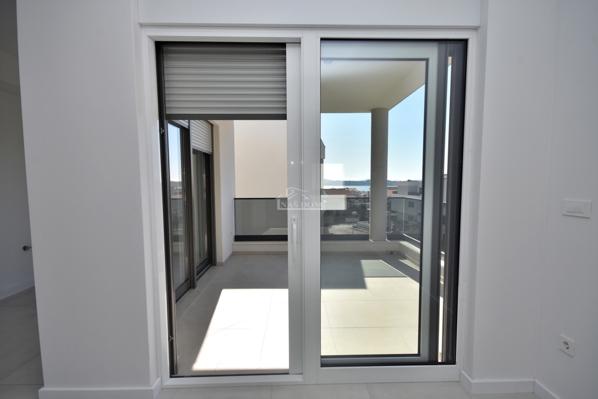 Appartamento moderno S7 con vista mare – nuova costruzione vicino alla spiaggia e al centro di Vodice