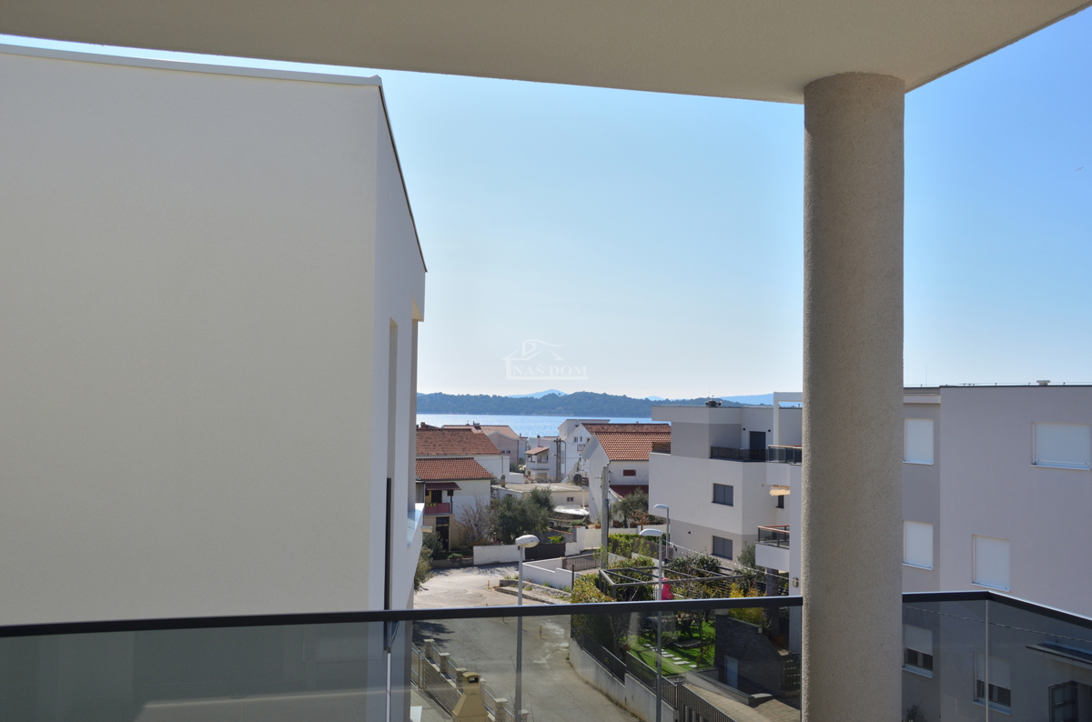 Appartamento moderno S7 con vista mare – nuova costruzione vicino alla spiaggia e al centro di Vodice