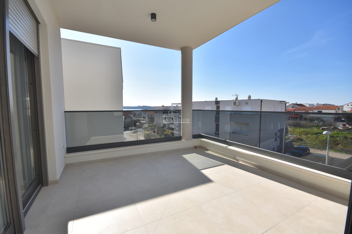 Appartamento moderno S7 con vista mare – nuova costruzione vicino alla spiaggia e al centro di Vodice