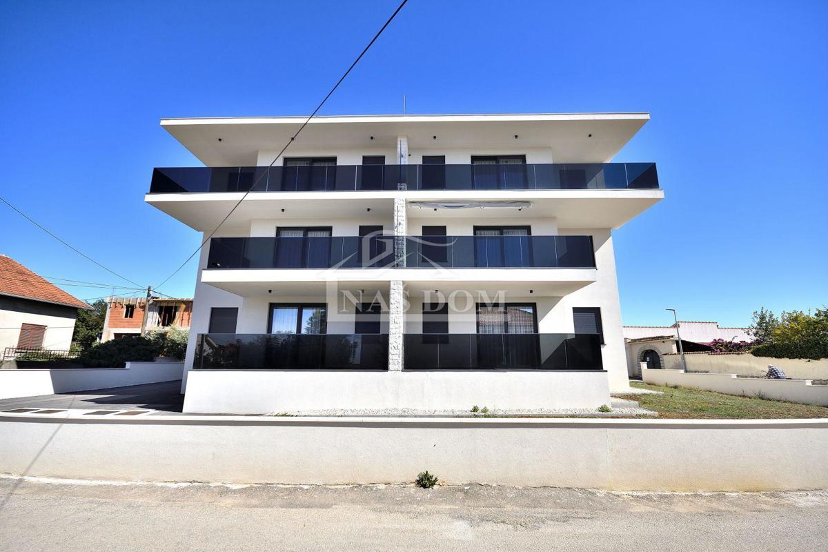 Vodice - *NEW BUILDING* apartment on the ground floor with garden and garage, 650 m from the beach