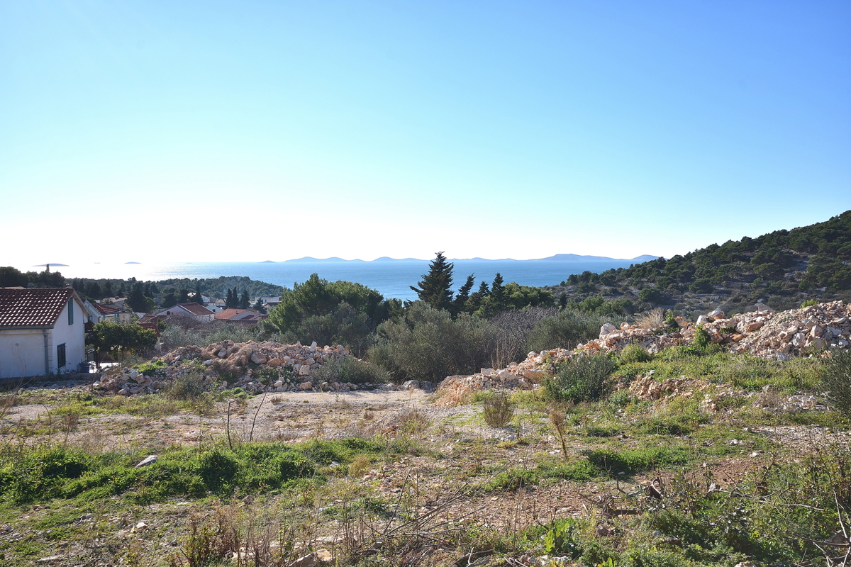 Murter - terreno edificabile con permesso di costruzione per una casa, vista mare