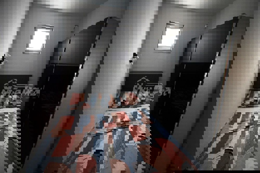 Appartamento a schiera con due camere da letto, vicino al centro