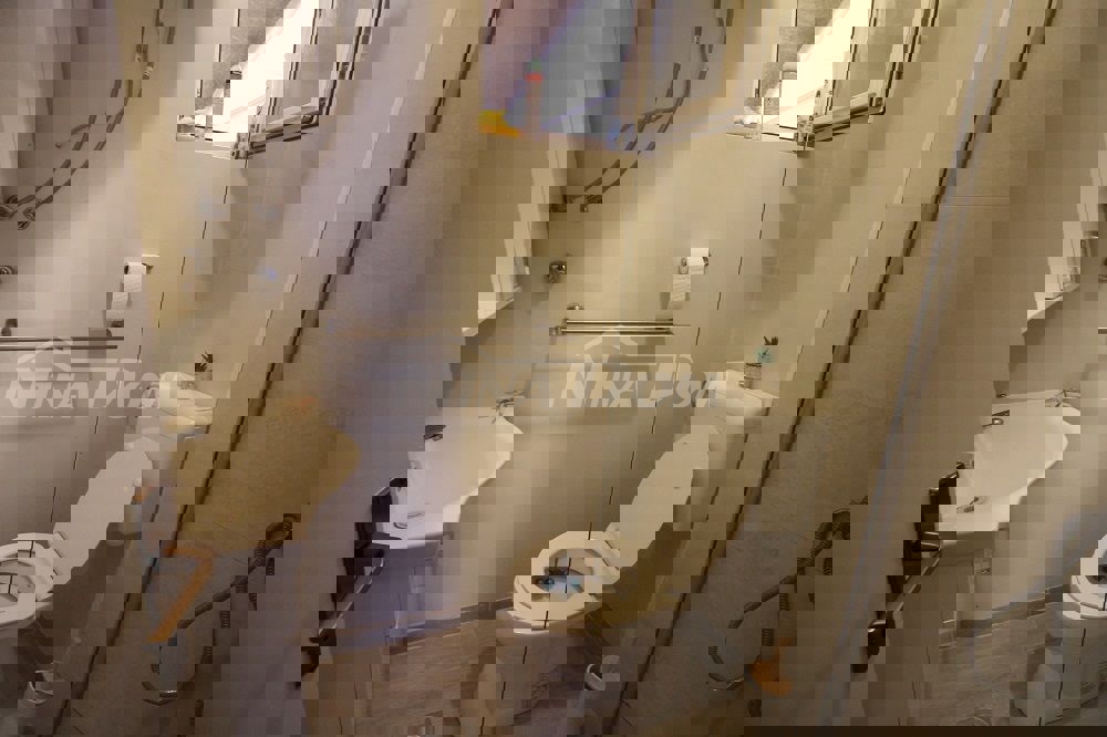 Appartamento a schiera con due camere da letto, vicino al centro