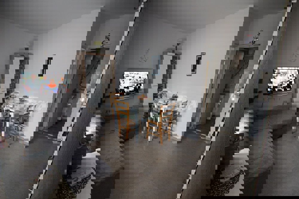 Appartamento a schiera con due camere da letto, vicino al centro