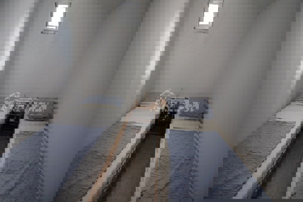 Appartamento a schiera con due camere da letto, vicino al centro