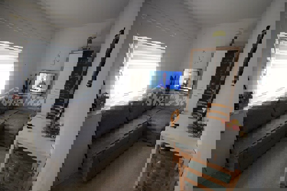 Appartamento a schiera con due camere da letto, vicino al centro