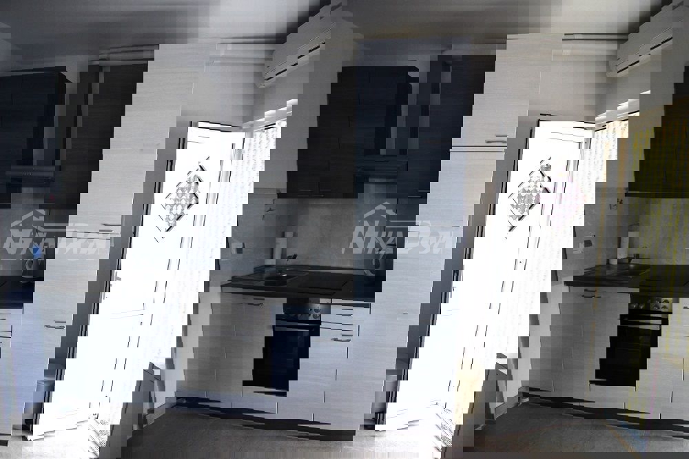 Appartamento a schiera con due camere da letto, vicino al centro