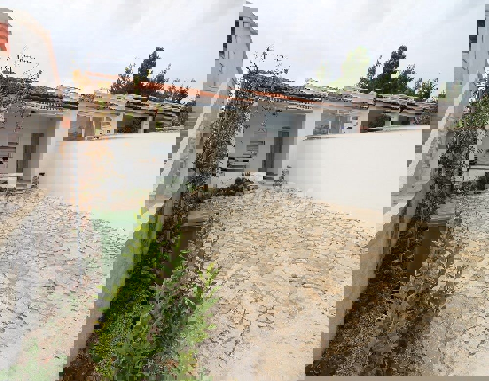 Appartamento a schiera con due camere da letto, vicino al centro