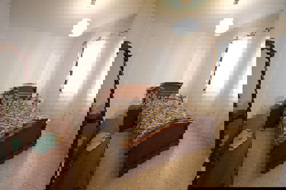 Proprietà di famiglia con un bellissimo giardino