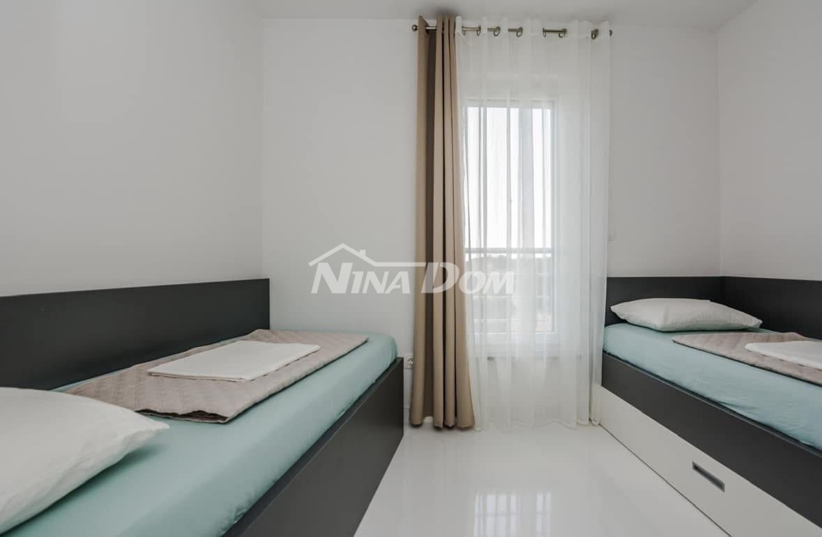 Palazzina con tre unità abitative, completamente attrezzata.