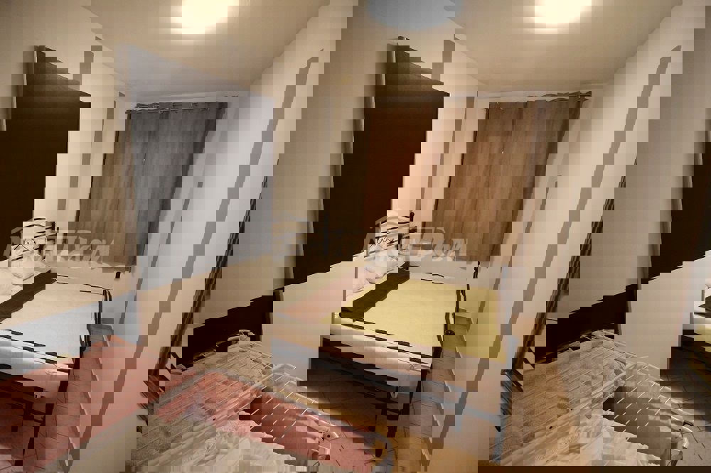 Appartamento al piano terra con due camere da letto a 80 metri dalla spiaggia