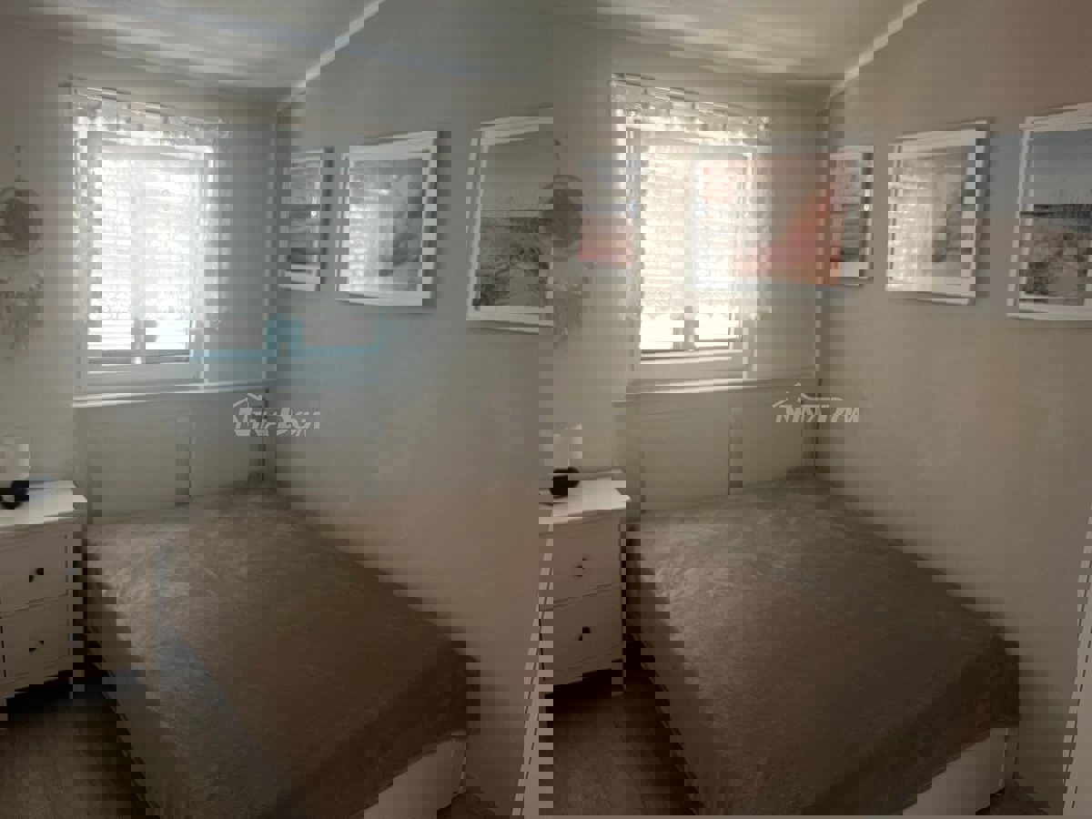 Proprietà familiare con due appartamenti con tre camere da letto, vicino al centro.