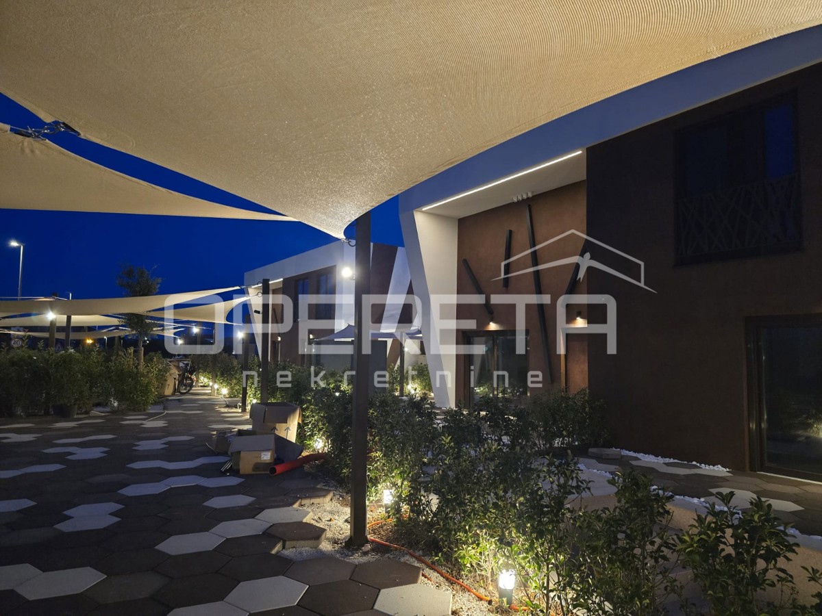 Nin: Casa moderna con piscina, sauna e giardino verde A4