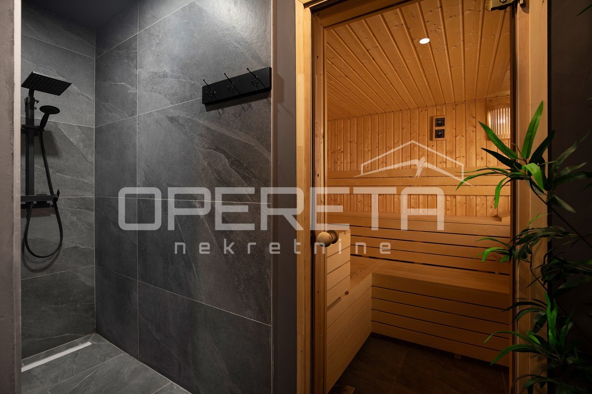 Moderna residenza di 300 m2 con vista mare, cucina estiva e finiture di alta qualità