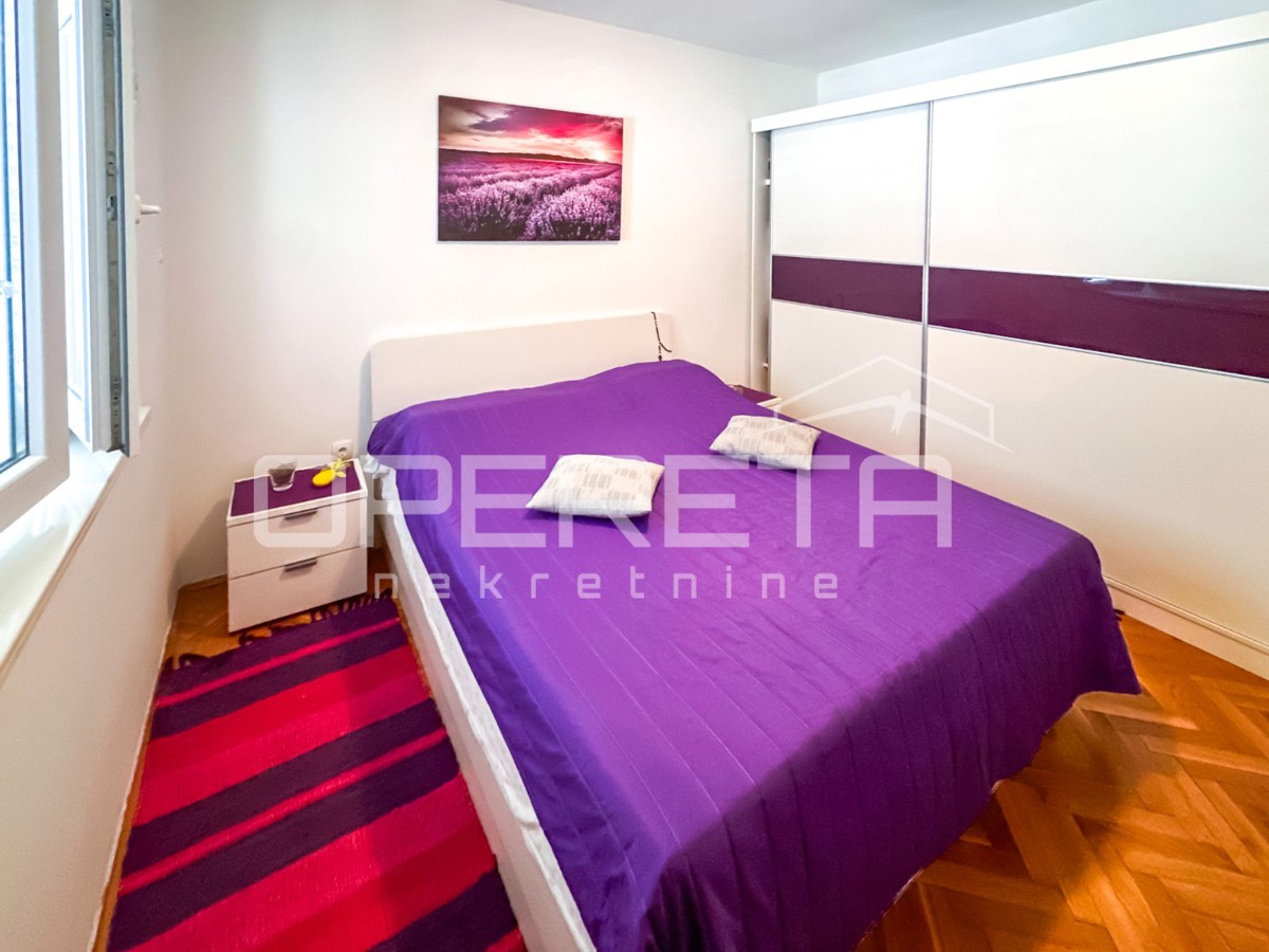 Appartamento con giardino e garage convertito in spazio abitativo