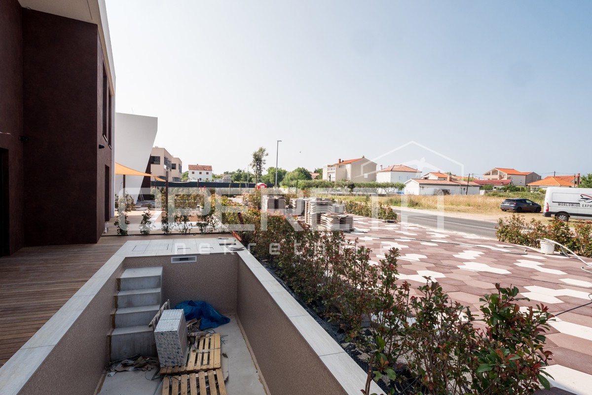 Oasi moderna ed energeticamente efficiente a Nin con piscina e sauna, appartamento A1