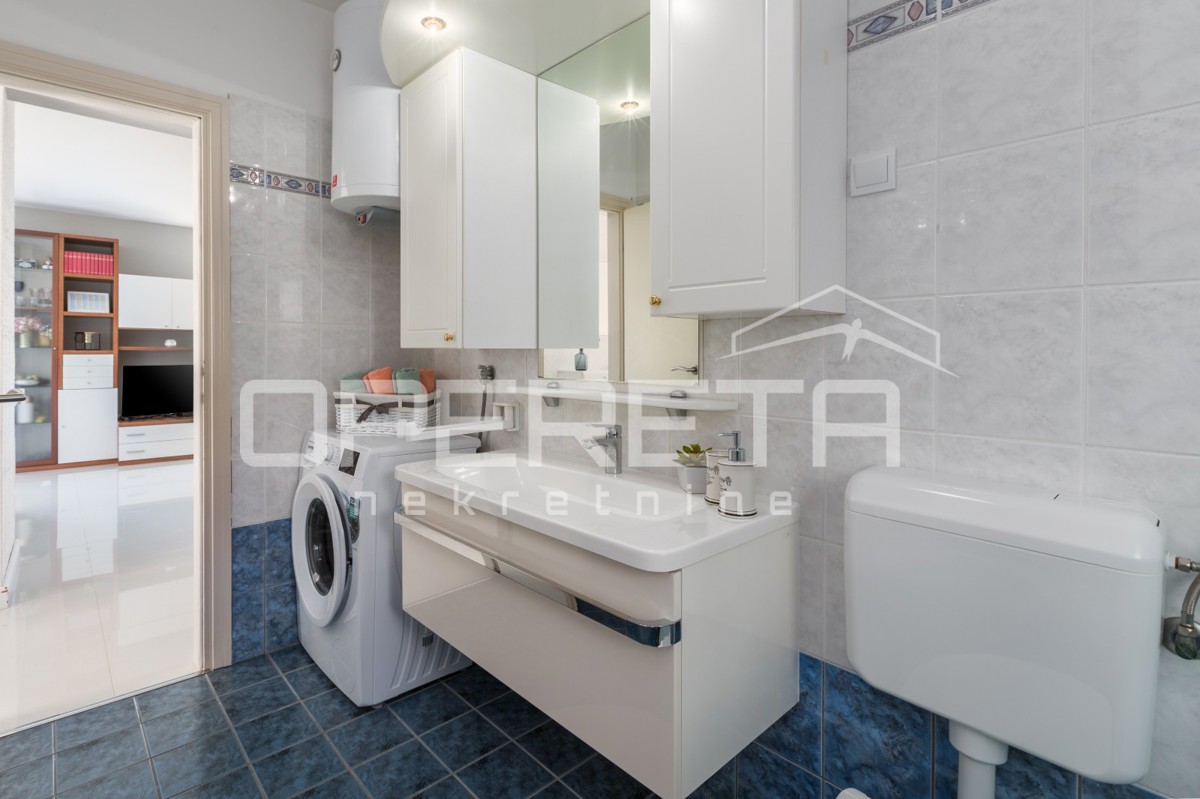 Funtana – appartamento al piano terra con due camere da letto e giardino.