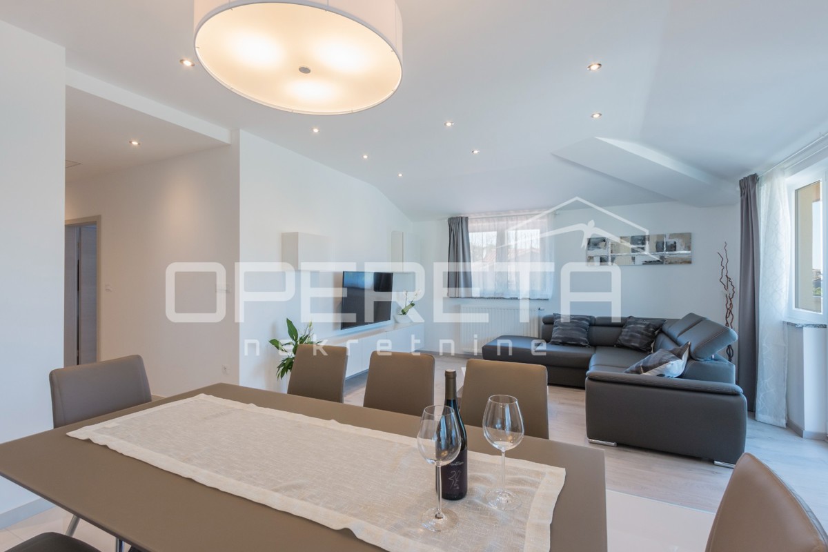 APPARTAMENTO LUSSUOSO A MEDULIN – 95 m² con grande terrazza e parcheggio!