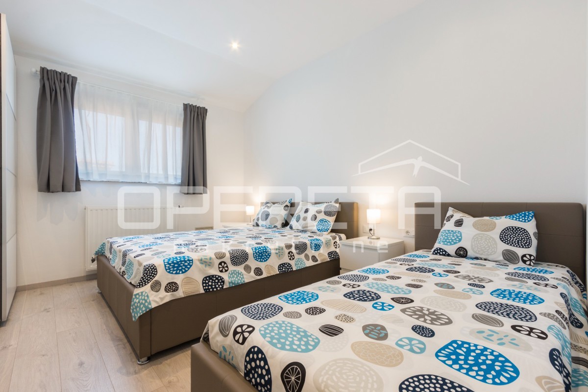 APPARTAMENTO LUSSUOSO A MEDULIN – 95 m² con grande terrazza e parcheggio!