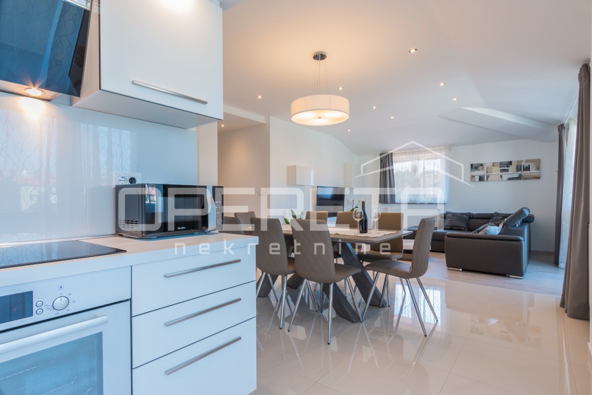 APPARTAMENTO LUSSUOSO A MEDULIN – 95 m² con grande terrazza e parcheggio!