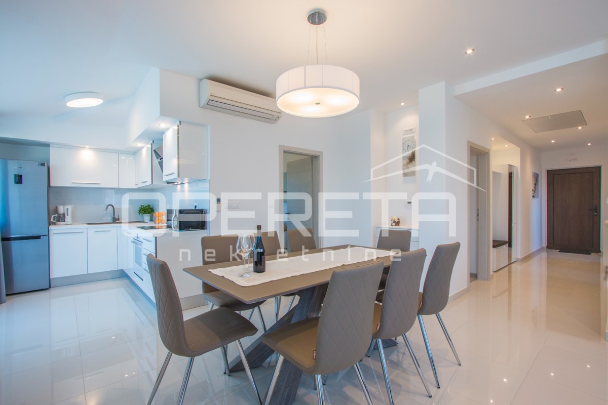 APPARTAMENTO LUSSUOSO A MEDULIN – 95 m² con grande terrazza e parcheggio!