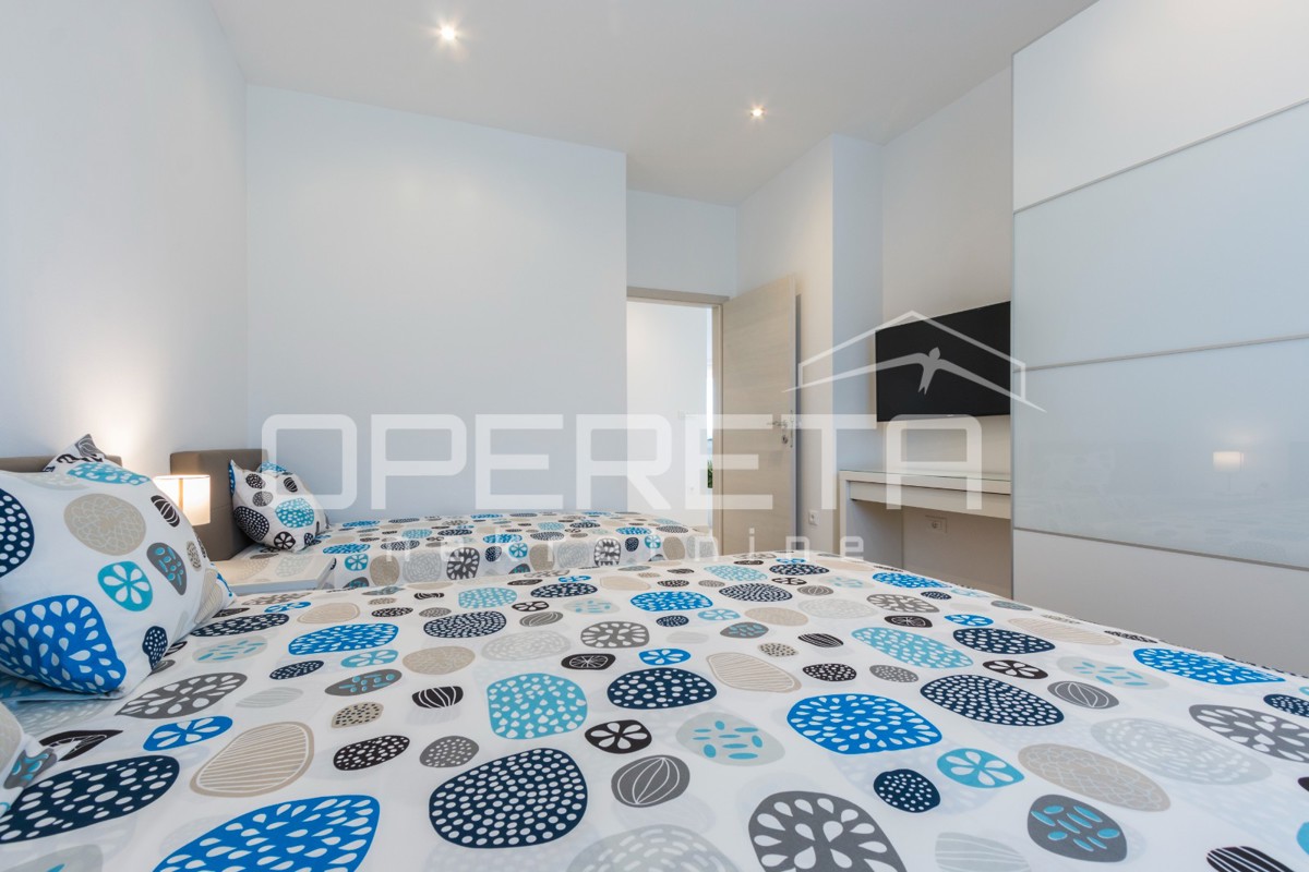 APPARTAMENTO LUSSUOSO A MEDULIN – 95 m² con grande terrazza e parcheggio!
