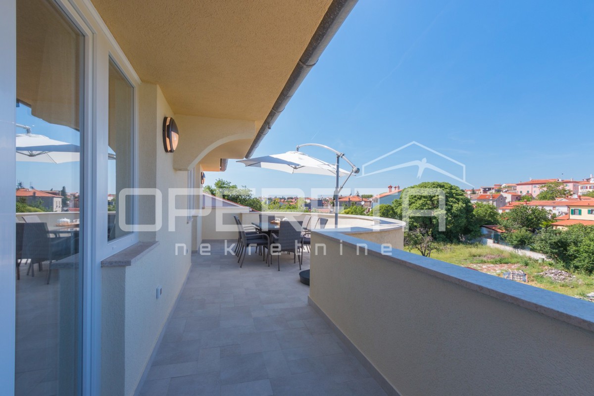 APPARTAMENTO LUSSUOSO A MEDULIN – 95 m² con grande terrazza e parcheggio!