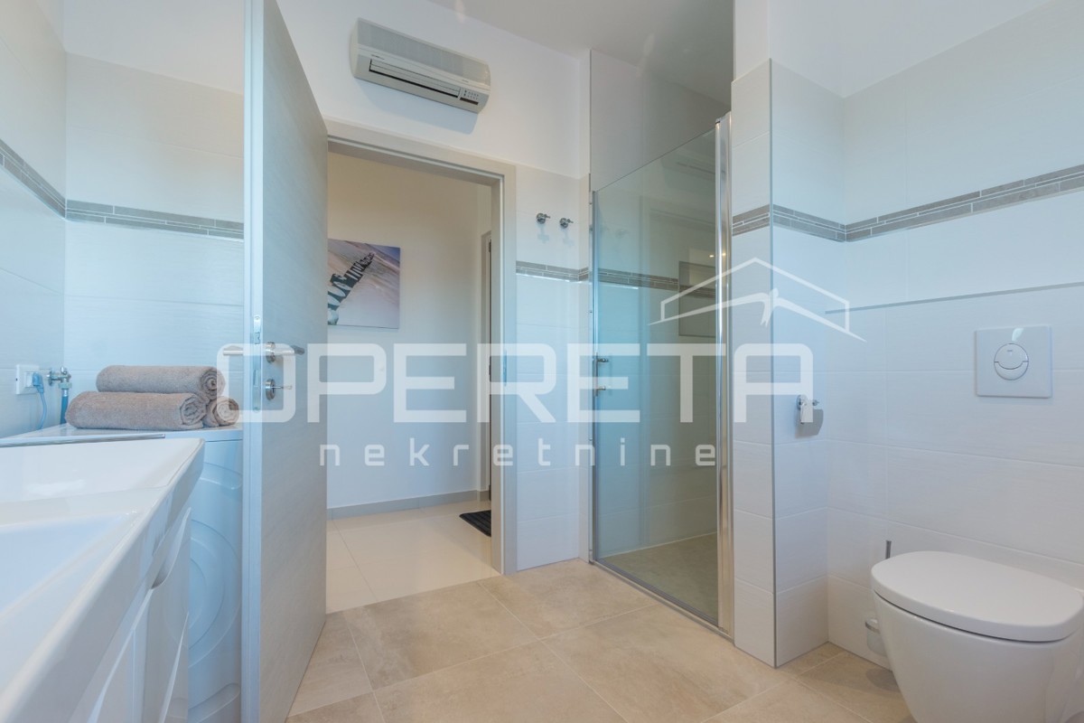 APPARTAMENTO LUSSUOSO A MEDULIN – 95 m² con grande terrazza e parcheggio!