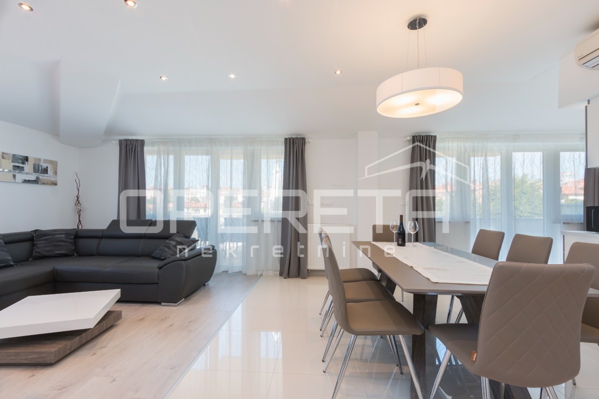 APPARTAMENTO LUSSUOSO A MEDULIN – 95 m² con grande terrazza e parcheggio!