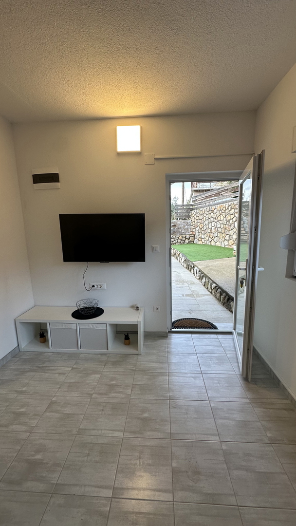 Appartamento affascinante con giardino e barbecue – 200 m dal mare, posizione tranquilla