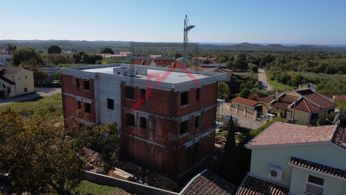 Nuova costruzione di qualità con vista mare e ampia terrazza in posizione tranquilla