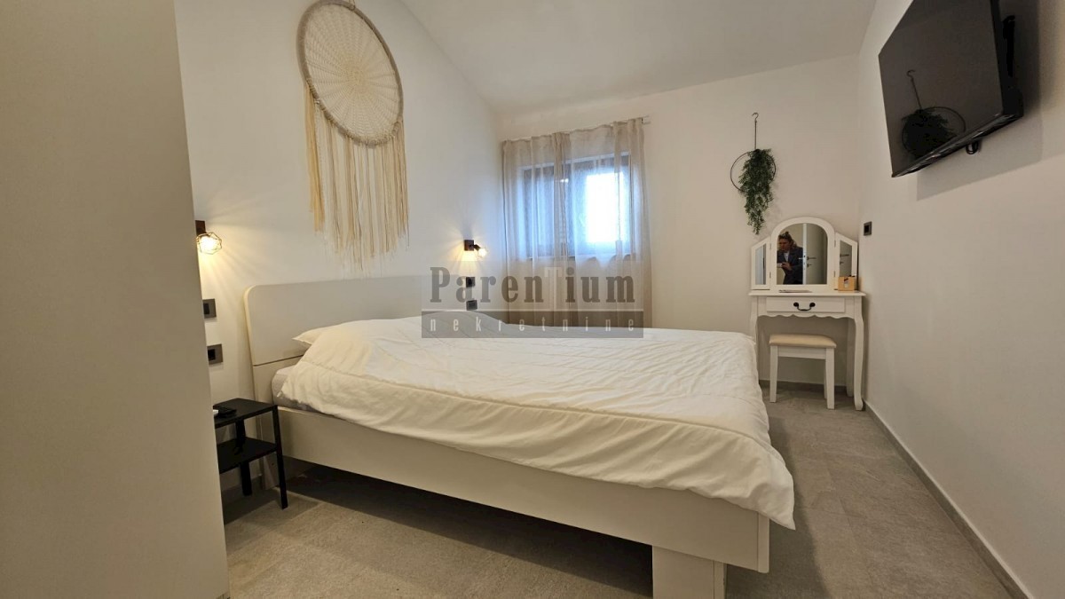 Appartamento con due camere da letto, 63m2