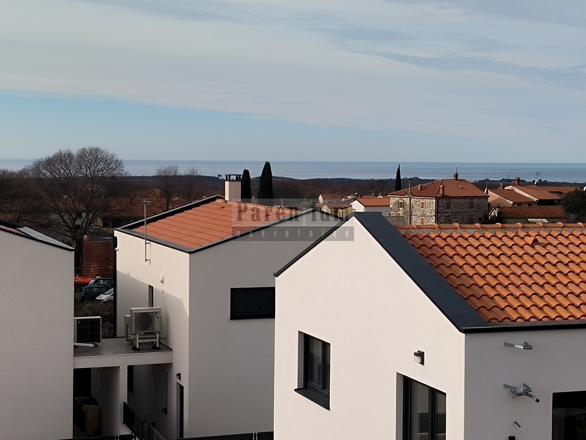 Appartamento con terrazza sul tetto e vista mare